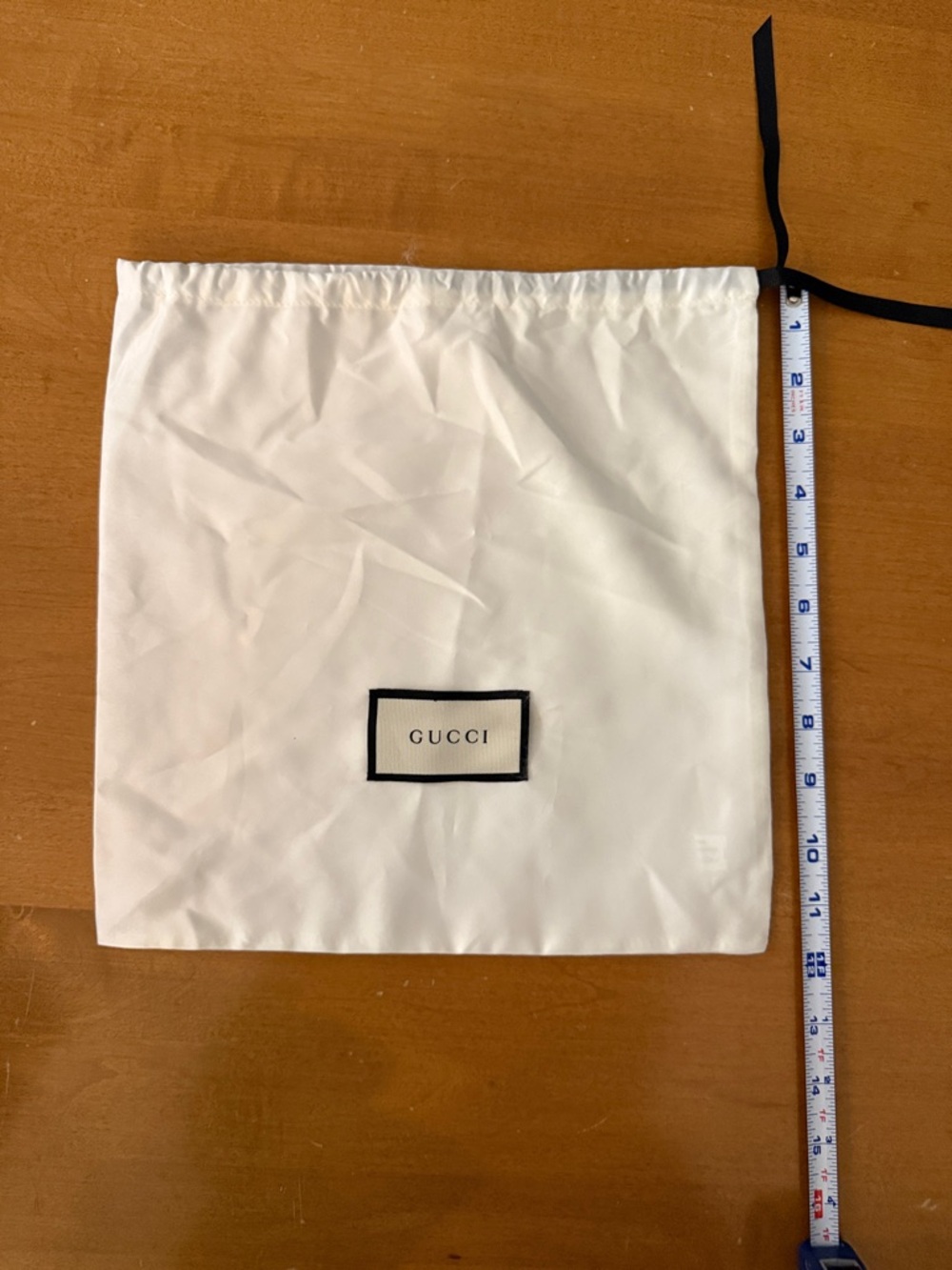 Gucci light cream, satin-y Dust Bag with Black Logo Patch and Black Drawstring